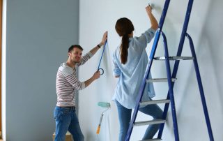 Portrait,Of,Happy,Smiling,Young,Couple,Painting,Interior,Wall,New